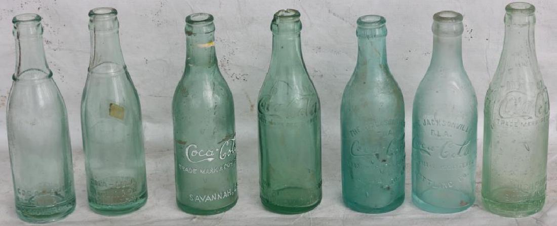COLLECTION OF 7 VARIOUS STYLE EARLY COKE BOTTLES,: FLORIDA, GEORGIA, VIRGINIA, JACKSONVILLE, NORTH CAROLINA, 7 3/4" TO 8"H, QUINCY, FL BOTTLE SHOWS ROUGHAGE TO TOP