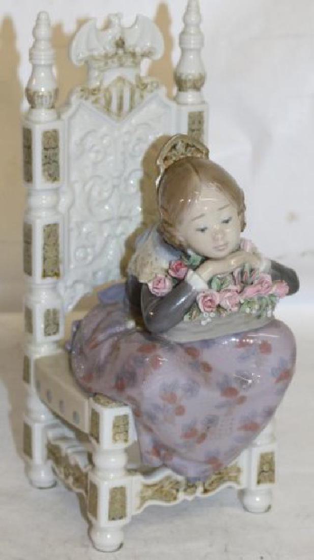 LARGE LLADRO DEPICTING VALENCIAN GIRL ON THRONE: HOLDING A BASKET OF FLOWERS, FIGURES IS APPRX 11 IN. TALL AND IN EXCELLENT CONDITION