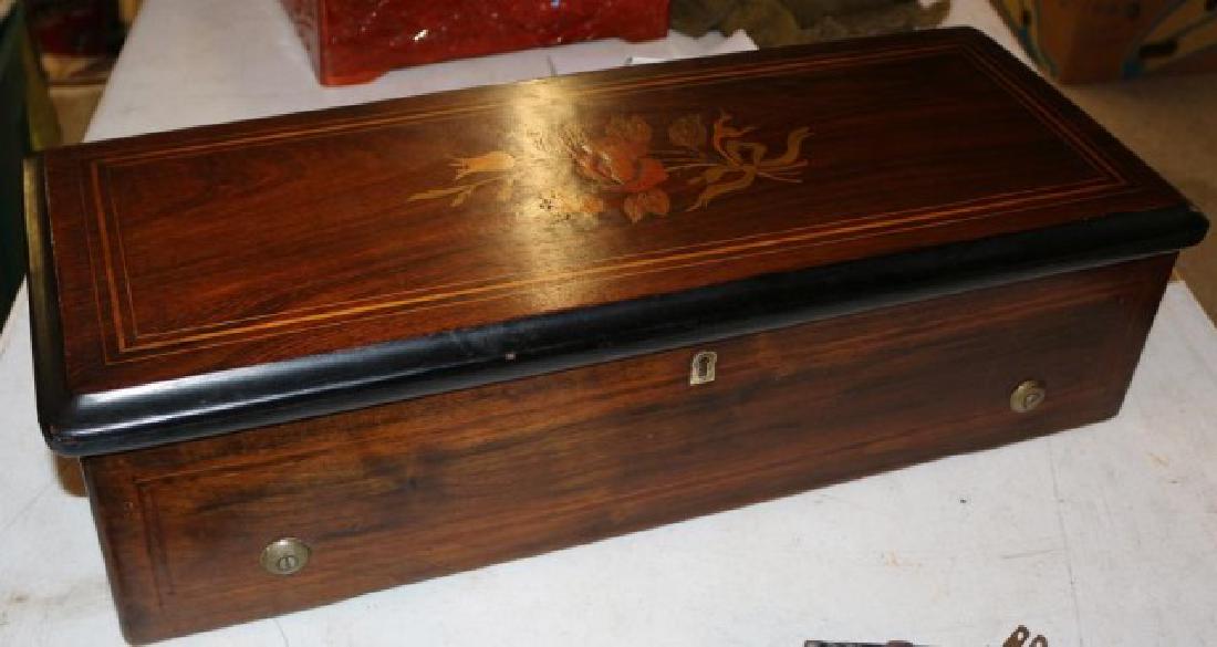 ANTIQUE JACOTS SWISS 12 TUNE MUSIC BOX, 1880S: WAS WORKING & OWNER OVERWOUND RECENTLY, BEAUTIFUL SOUND OTHERWISE, MEAS. 6" T X 22" L X 8 1/4" D, INCL. MUSIC LIST