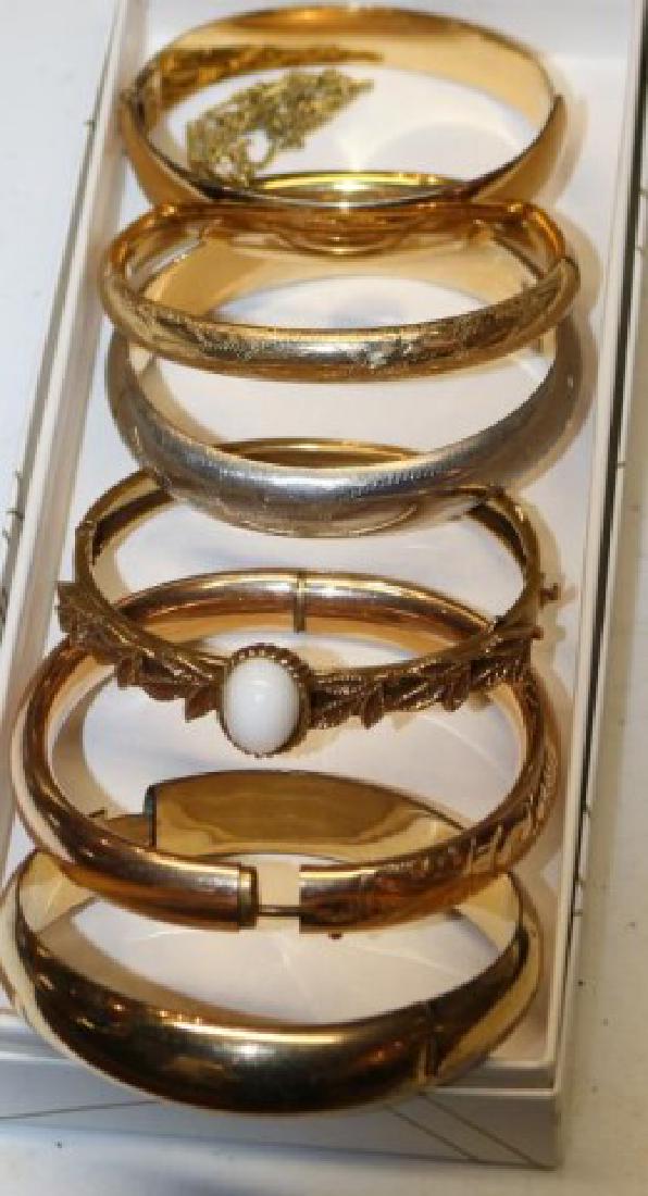 6 GOLD FILLED BANGLE BRACELETS: SOME W/ SAFETY CHAINS