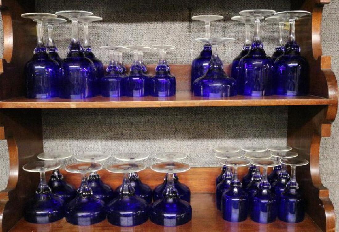 36 PCS COBALT ART GLASS STEMWARE W/ CLEAR: APPLIED STEMS, INCL. WINE, CHAMPAGNE, CORDIAL & LIQUOR, 9 IN EACH SIZE OF 3 3/4", 4 1/4", 4 3/4" AND 6 1/2"T. EXCELLENT CONDITION