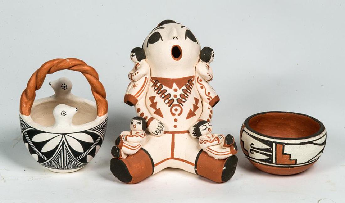 TWO POTS, AND ACOMA PUEBLO STORYTELLER: SOUTHWEST POTTERY INCLUDING SMALL ZIA RED POT WITH RED STEPS AND FISH TAILS, SIGNED "JULIA SAIZ, ZIA", 3 1/2" DIA; ACOMA PUEBLO STORYTELLER, SINGER WITH CHILDREN, SEATED FIGURE, ACOMA, NM, 6" H; POT W
