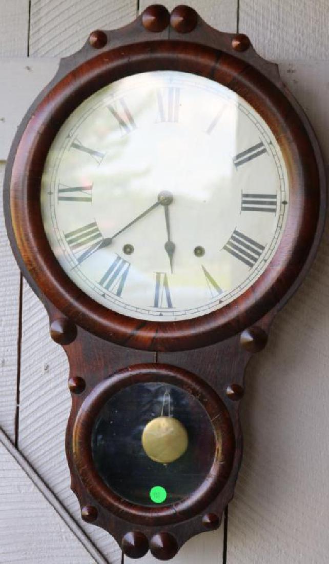 SETH THOMAS ROSEWOOD WALL CLOCK, TIME &: STRIKE, 25"H X 15"W, CURRENT WORKING CONDITION W/KEY & PENDULUM