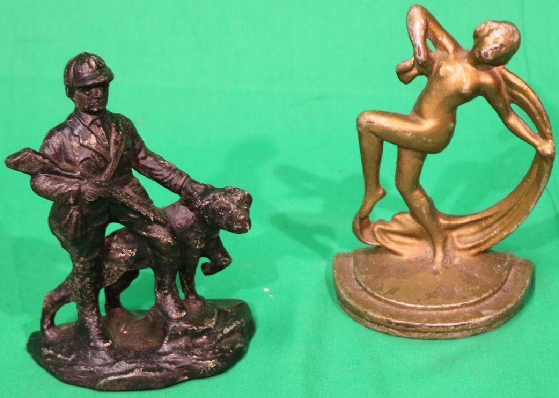 2 FIGURAL DOORSTOPS INCL HUNTER & DECO WOMAN, 6": H