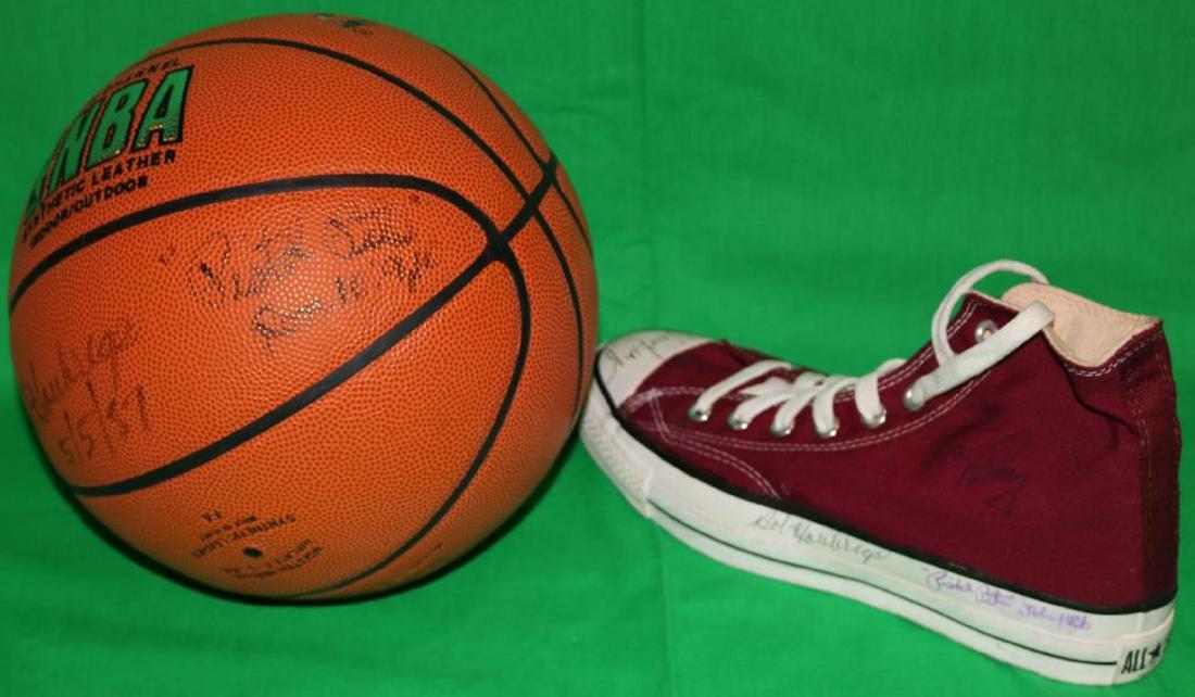 BOSTON CELTICS 2 PIECE LOT TO INCLUDE A: BASKETBALL SIGNED BY PISTOL PETE MARAVICH, WALT FRAZIER AND OTHERS. ALONG WITH A SNEAKER SIGNED PISTOL PETE MARAVICH AND OTHERS, 11 3/4" LONG, GOOD CONDITION.