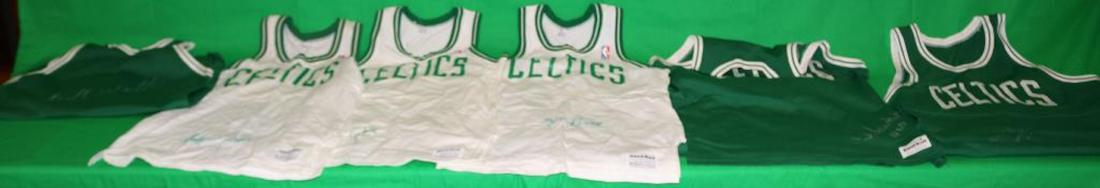 LOT OF 6 BOSTON CELTIC SIGNED JERSEYS TO INCLUDE: ONES SIGNED BY BILL WALTON, SAM JONES, FRANK RAMSEY, JOJO WHITE, KEVIN MCHALE. ONE IS ILLEGIBLE. ONE SHOWS LIGHT DISCOLORATION. OTHERS ARE IN GOOD CONDITION.