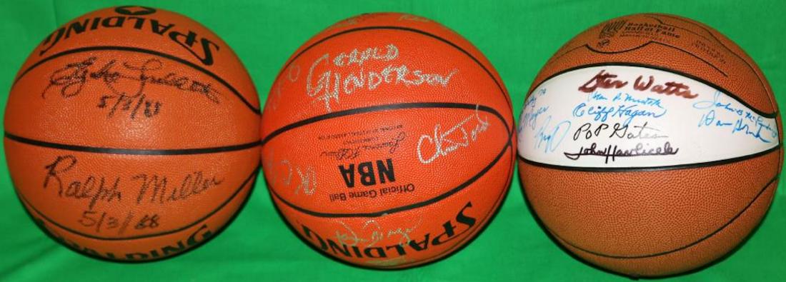 LOT OF 3 SPALDING NBA SIGNED BASKETBALLS TO: INCLUDE ONE SIGNED BY CLYDE LOVELLETTE, RALPH MILLER, WES UNSELD. ONE SIGNED BY KEVIN MCHALE, CEDRIC MAXWELL, RED AUERBACH, K.C. JONES, GREG KITE, DENNIS JOHNSON, M.L. CARR, AND GERALD HENDERSON. THE 