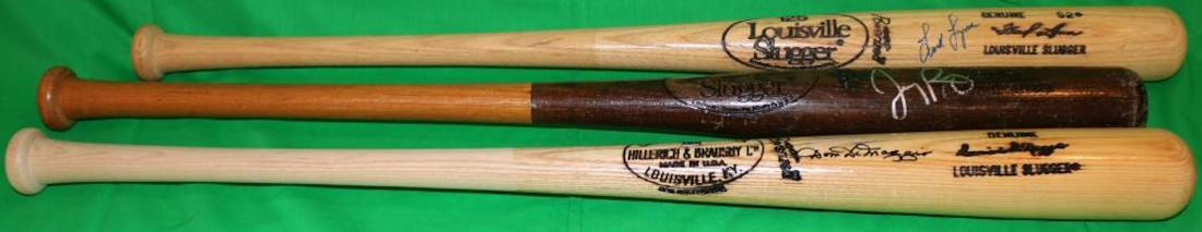 LOT OF 3 RED SOX SIGNED LOUISVILLE SLUGGER: BASEBALL BATS. ONE SIGNED FRED LYNN, MARKED 4 ON KNOB, 33 3/4" LONG. ONE SIGNED JERRY REMY, DARK BROWN TWO-TONE FINISH, 33 3/4" LONG, CUSTOM TURNED END, K48. THE LAST IS SIGNED DOM DIMAGGIO, R43 ON KN