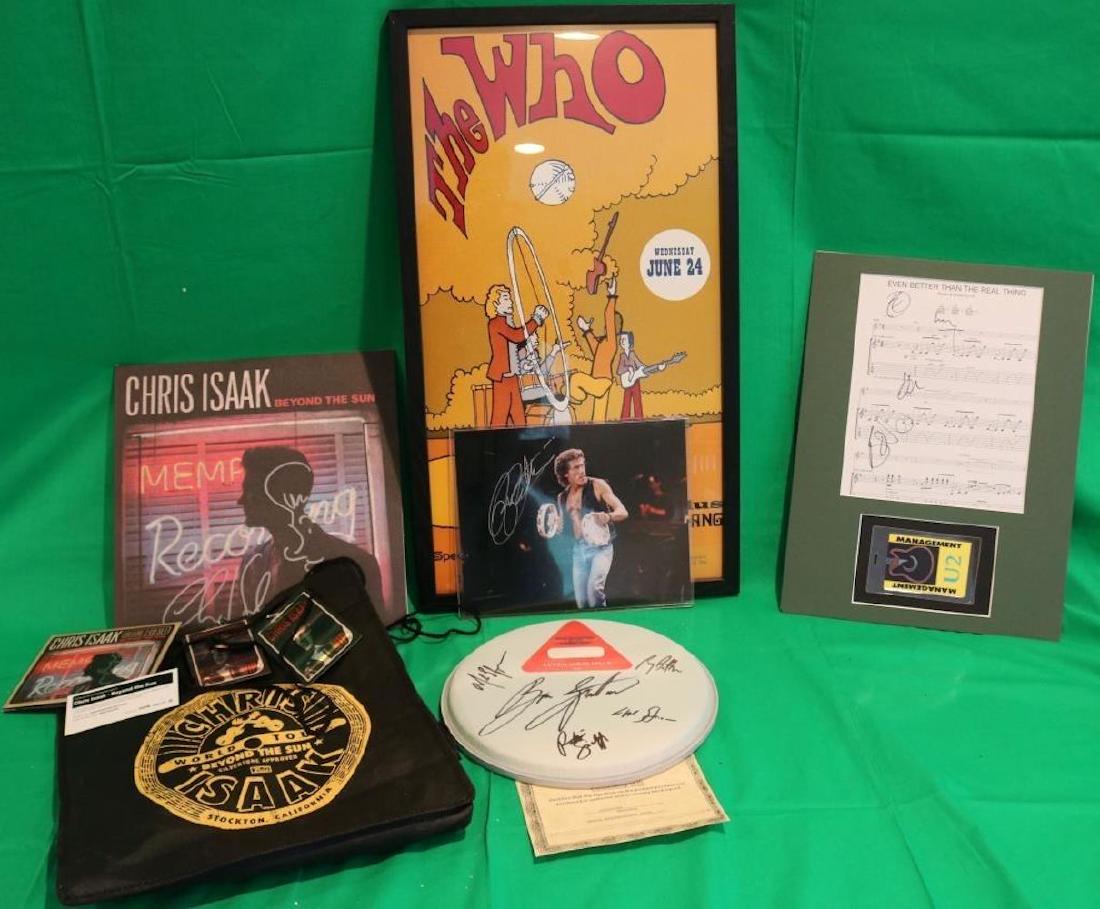 ROCK AND ROLL 10 PIECE MEMORABILIA LOT TO INCLUDE: A BONO U2 SIGNED MUSIC SHEET WITH MANAGEMENT PASS MOUNTED 16" X 12". ROGER DALTREY SIGNED PHOTO 8" X 9 3/4" WITH CERTIFICATE OF AUTHENTICITY. A DRUM HEAD SIGNED BRUCE SPRINGSTEEN, E STREET BAND WITH A