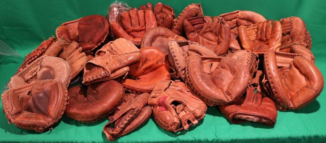 37 VINTAGE USED BASEBALL GLOVES, RAWLINGS, JC: HIGGINS, MACGREGOR. FIELDING AND CATCHERS. CONDITION MOSTLY IN GOOD TO VERY GOOD, SOME LEFTY.