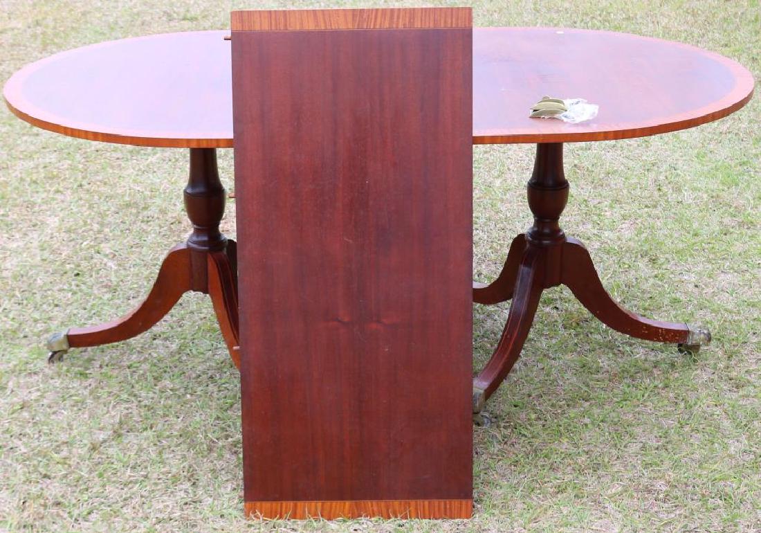 SMALL INLAID MAHOGANY 2 PART BANQUET TABLE: WITH 1 LEAF, DUNCAN PHYFE STYLE, ROUNDED ENDS, ORIGINAL FINISH, SHOWS SOME WEAR, 29" H X 56" W X 39" D, COMPLETE WITH BRASS CLIPS, 17 3/4" LEAF
