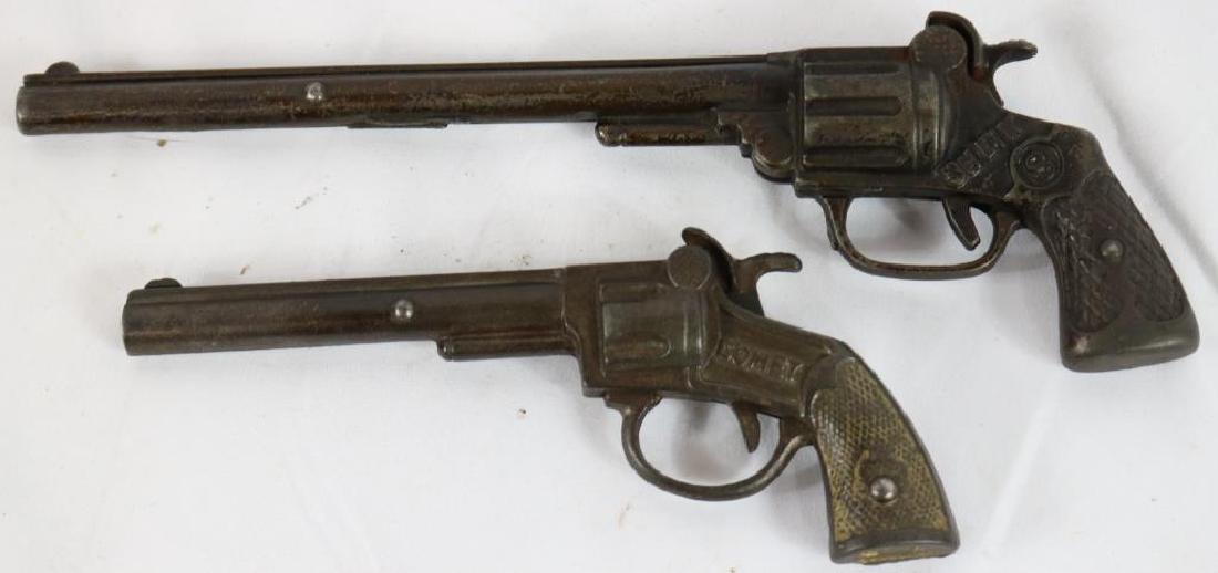 2 EARLY CAST IRON LONG BARREL CAP GUNS TO INCLUDE: B.H. ELK, 101/2" L, AND 7" COMET