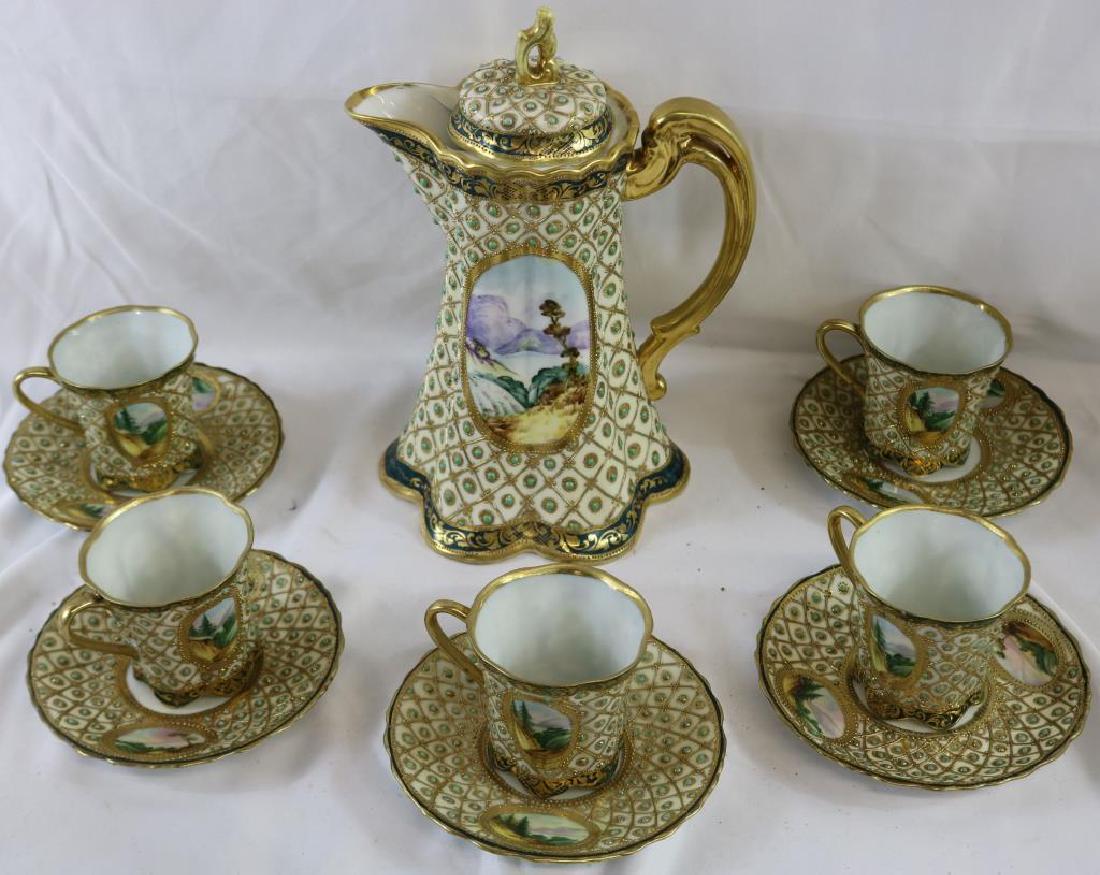 11 PC. SCENIC NIPPON CHOCOLATE SET, 5 CUPS &: SAUCERS & CHOCOLATE POT, POT 9" H, SHOWS BEADWORK & GOLD GILDING