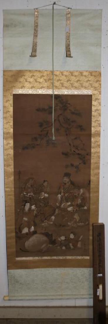 WATERCOLOR ON PAPER SHICHI FUKUJIN SCROLL, SEVEN: GODS OF GOOD FORTUNE WITH 2 CHILDREN & FEMALE, BONE ROLLERS, SHOWS SOME INSECT DAMAGE TO BROCADE BORDER, 46 1/2" X 21 1/2" SIGHT, 83" X 26 3/4" OVERALL, FROM EX-AMBASSADOR MORGAN COLLECTION