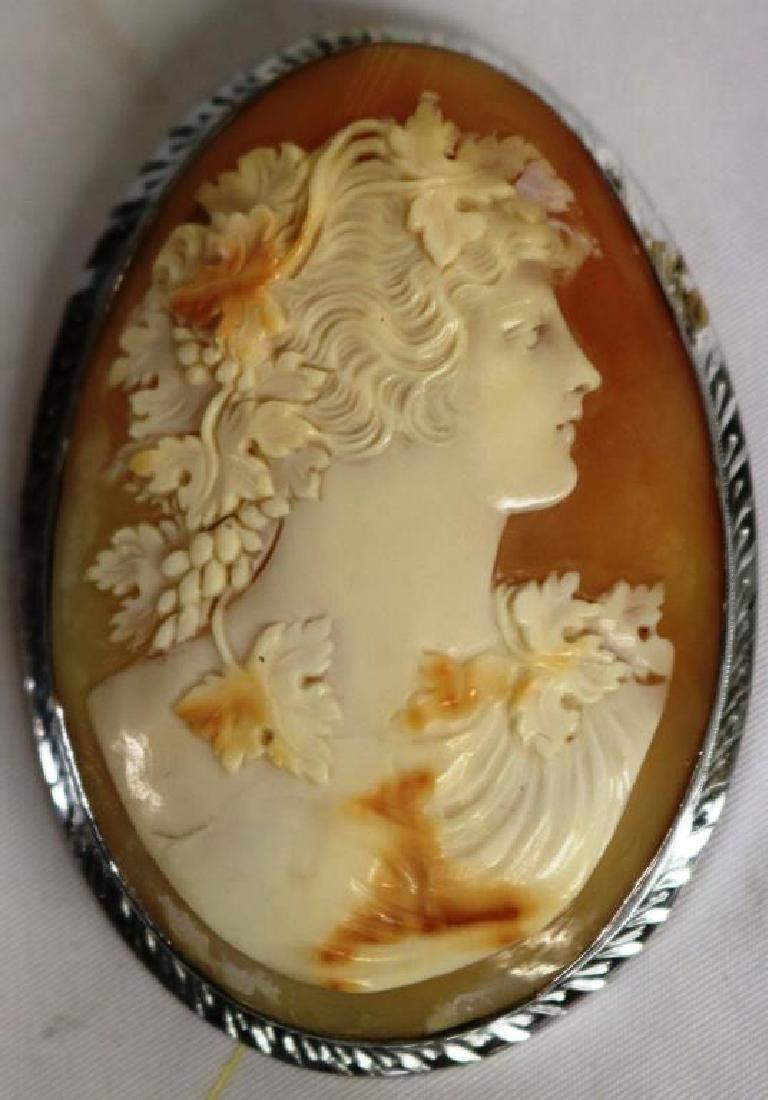 LARGE SHELL CARVED CAMEO BUST OF WOMAN IN SILVER: ON COPPER SETTINGS, 2 3/4" H, 2" W