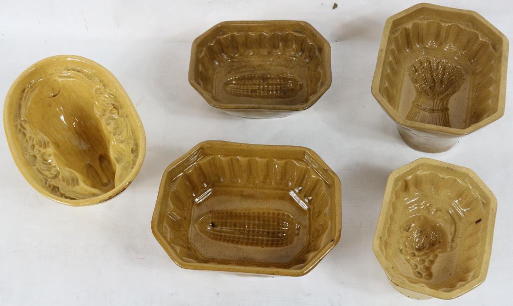 LOT OF 5 YELLOW WARE PUDDING MOLDS TO INCLUDE: CORN, GRAPE, WHEAT & RABBIT DESIGNS, 2 3/4" - 3" H, 5 1/4" - 7 1/2" W, 4" - 5 1/2" DEEP