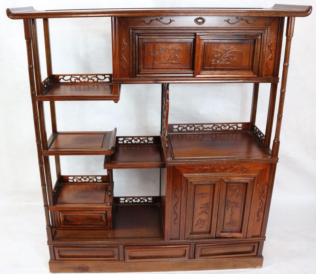 20TH C. ORIENTAL STYLE CARVED MAHOGANY CURIO: CABINET WITH SLIDING DOORS, DRAWERS AND BAMBOO TURNINGS, 49 1/2" H, 46 1/4" W, 14 1/4" D