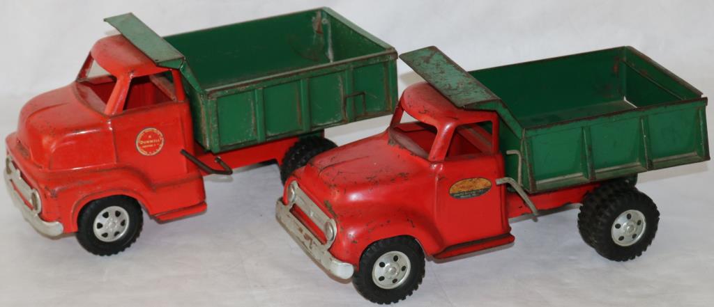 2 PRESSED STEEL DUMP TRUCKS, ONE BY DUNWELL, ONE: BY TONKA 6 1/4" - 6 1/2" H, 12-13" L, 5 1/4" - 6" W