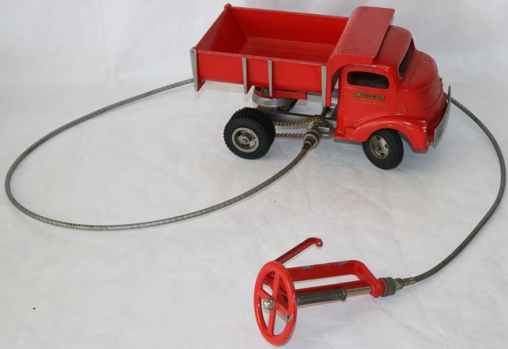 CAST METAL HAND CONTROLLED DUMP TRUCK BY SMITH &: MILLER, CHAIN DRIVE, EXCELLENT CLEAN CONDITION, 6" H, 12" L, 5 1/2" W