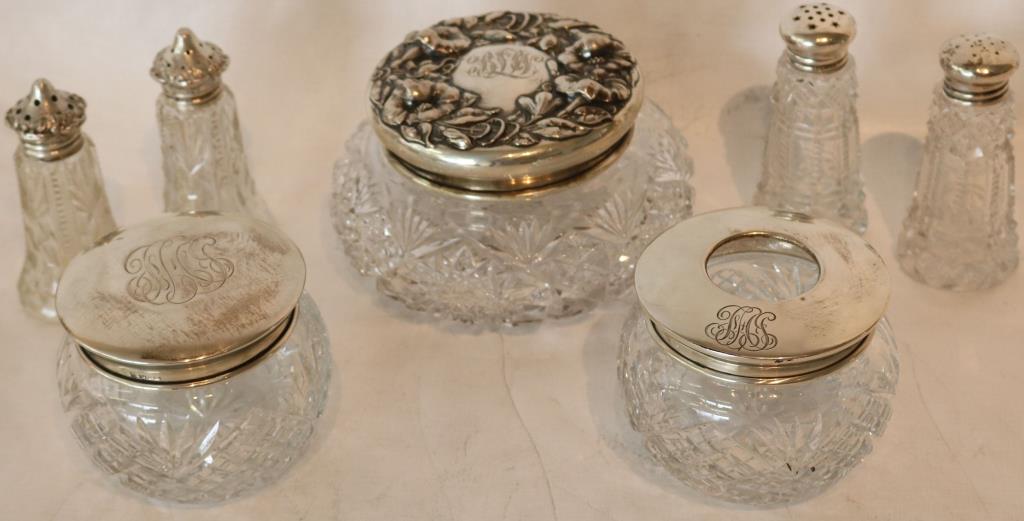 LOT OF 7 STERLING TOP CUT GLASS ITEMS TO INCLUDE: 5 1/2" DIA. BUREAU JAR, STRAWBERRY FAN CUT HAIR RECEIVER & JAR, 3 1/2" DIA., 2 PAIR APPROX. 4" SHAKERS