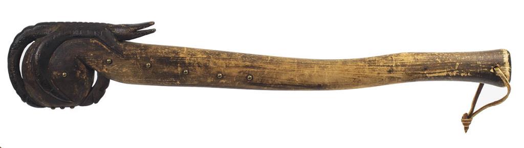 RARE SEMINOLE INDIAN CEREMONIAL DANCE WAR CLUB,: FLATTENED BALL HEAD GRIPPED WITH EAGLE TALONS THAT ALSO FORMS THE TAIL AND CLAWS OF AN ALLIGATOR, WITH CARVED TEETH AND EYES, BRASS BEADED DECORATION, FROM THE DR. WOLFE COLLECTION, NY, 23" L.