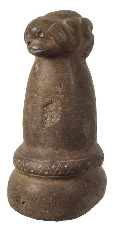 BROWN BASALT, MONKEY FIGURE SURMOUNTED ON A STONE: PESTLE, FROM THE DR. FRANK TOPLAK COLLECTION, PUERTO RICO, EX. SADOFSKY COLLECTION, 7" H.