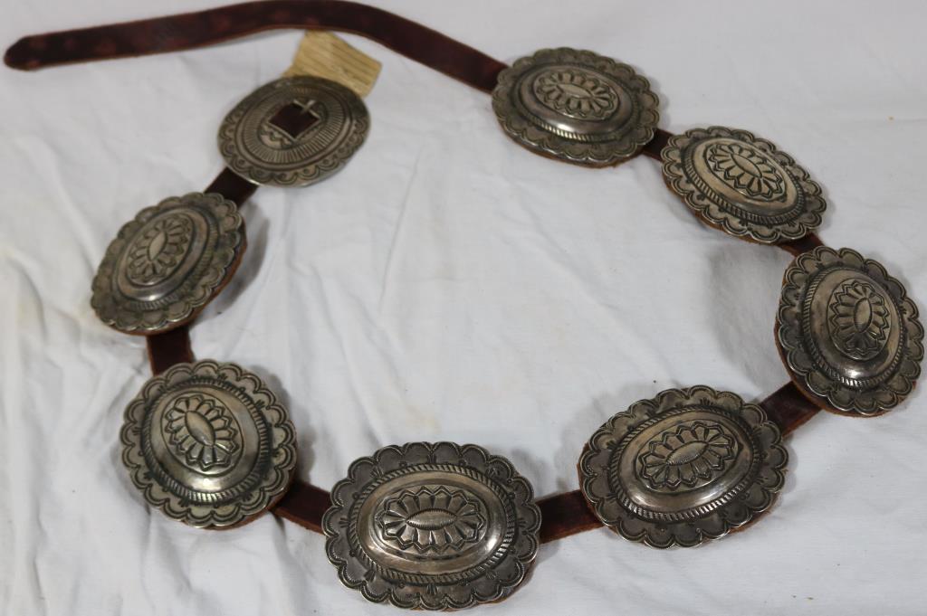 NAVAJO SILVER CONCHA BELT WITH ORIGINAL PAWN: TICKET, MADE WITH INGOT SILVER 3" X 3 3/4" CONCHAS, LATER LEATHER BELT, 46 1/2" L