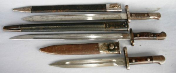 3 BAYONETS: 2 WITH LEATHER SCABBARDS 1 WITH METAL SCABBARD 21 1/2", 22 3/4", 15 3/4" L.