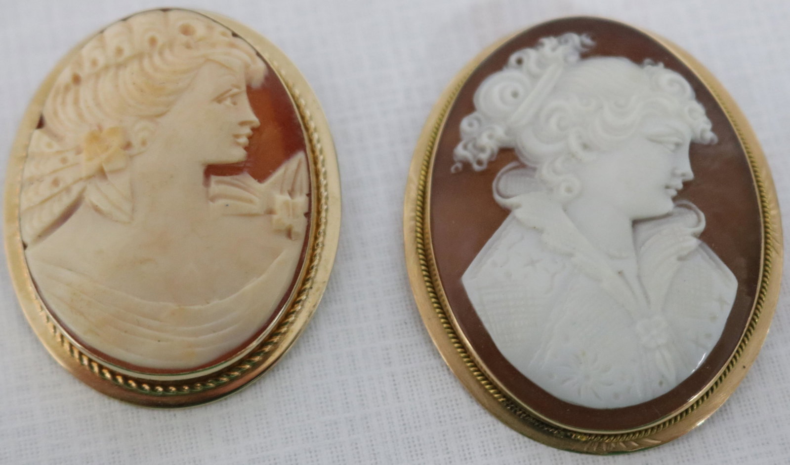 TWO 14K YELLOW GOLD SHELL CARVED CAMEOS DEPICTING: WOMEN, 10 DWT TOTAL WEIGHT