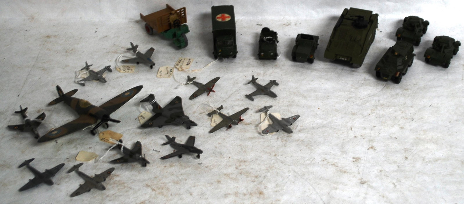 21 DINKY TOYS CAST METAL MILITARY VEHICLES INCL.: AMBULANCE, ARMORED PERSONAL CARRIER, STRIKER, MYSTERY IV, SPITFIRE, MOTORCART