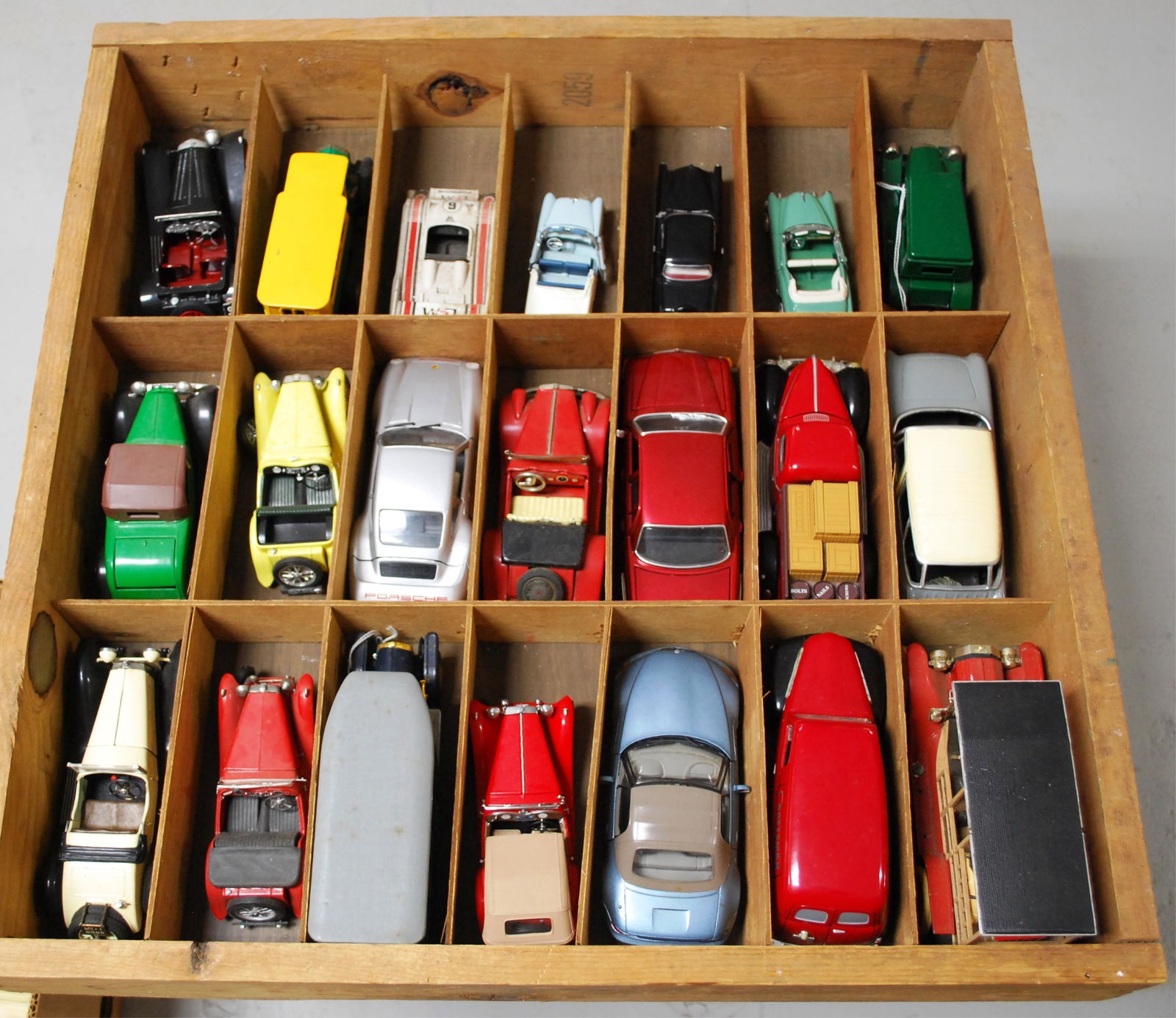 21 UNBOXED CARS FROM VARIOUS MAKERS IN SHADOW: BOX: TOGI, BURANGO, FRANKLIN MINT, MARTINO
