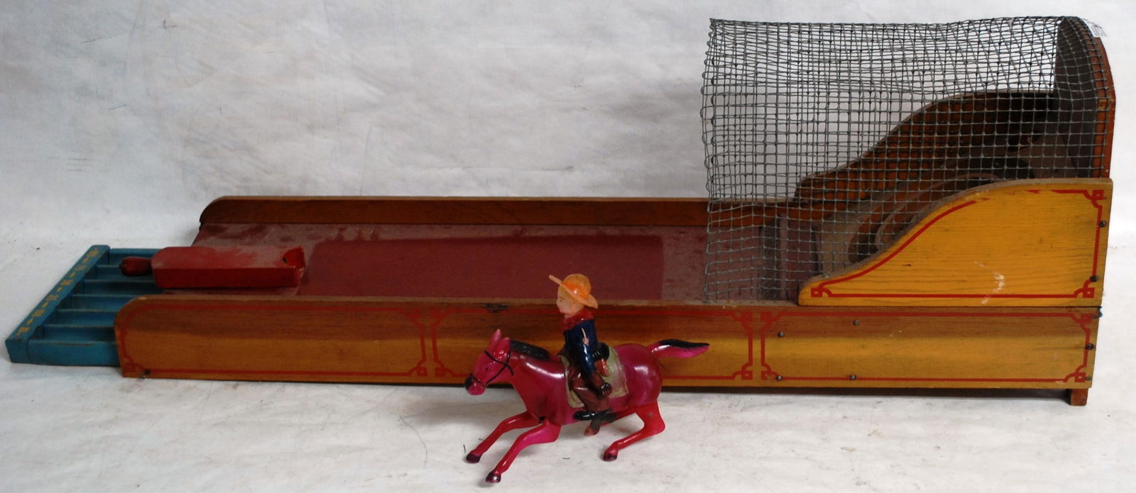 MARBLE SKEE BALL GAME & WIND UP PLASTIC COWBOY ON: HORSE BY