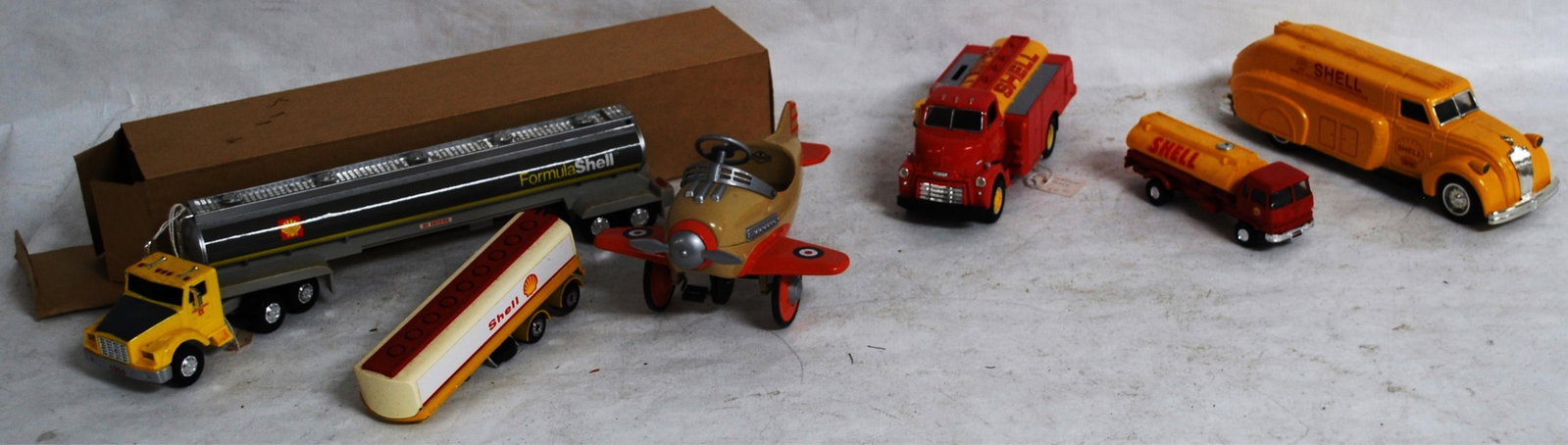 SIX ASSORTED VEHICLES: YONEZAWA SHELL TANKER,: AMERICAN CLASSICS, FIRST GEAR, KIDDIE CLASSICS AIRPLANE & '94 SHELL TANKER