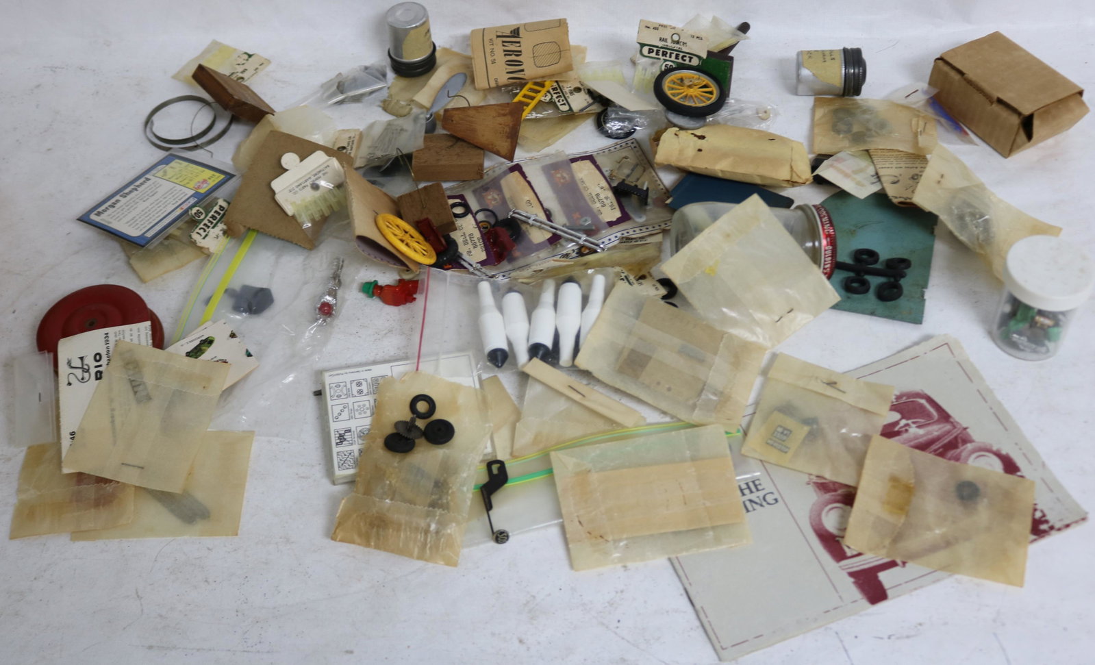 LOT OF MISC. TOY CAR PARTS & PCS, INCLUDING: TIRES, BELL CRANK, PROPELLERS, FIGURES, ETC.