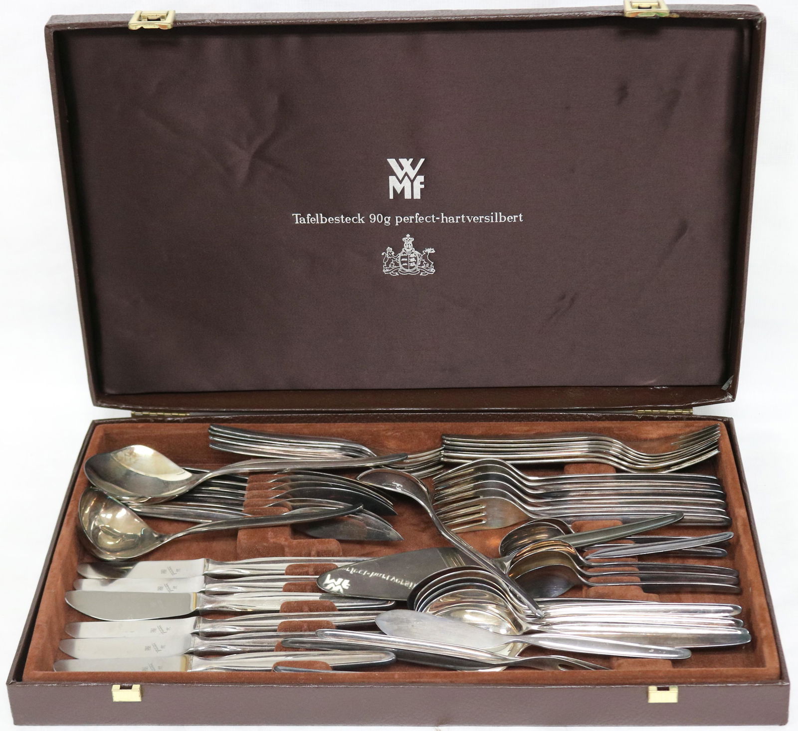 CONTINENTAL SILVER FLATWARE SET, SERVICE FOR 6,: TO INCLUDE 7 1/4" DINNER KNIVES, 7 1/4" SALAD FORKS, (4) 6 1/8" THREE TINE FORKS, (3) 7 1/2" TWO TINE FORKS, (6) 8" HANDLED KNIVES, 9 1/8" CAKE KNIFE, 8 1/4" LARGE SERVING SPOON, 7" LADLE, 7" BUTTER S
