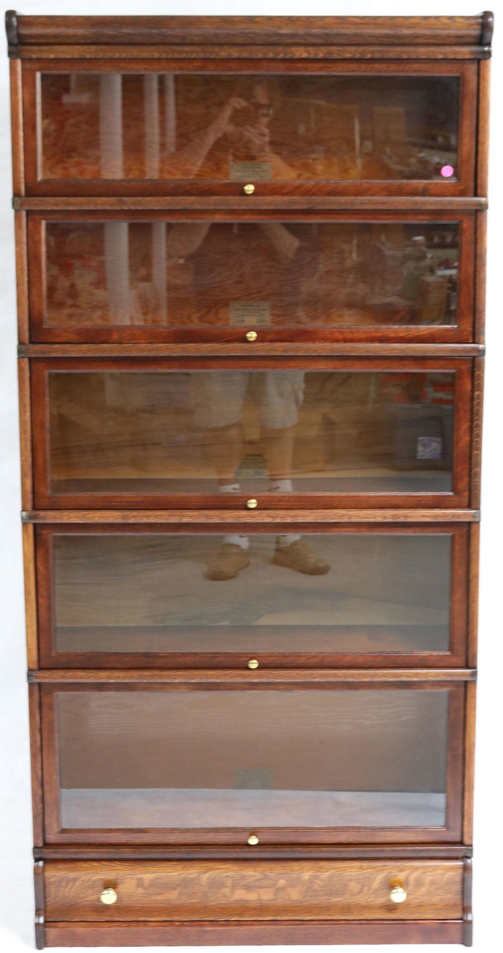5 STACK OAK GLOBE WERNICKE BOOKCASE ON 1 DRAWER: BASE, DARK REFINISHED CONDITION, BRASS KNOBS, BANDED SIDES, 70" H, 34" W, 11 1/2' DEEP