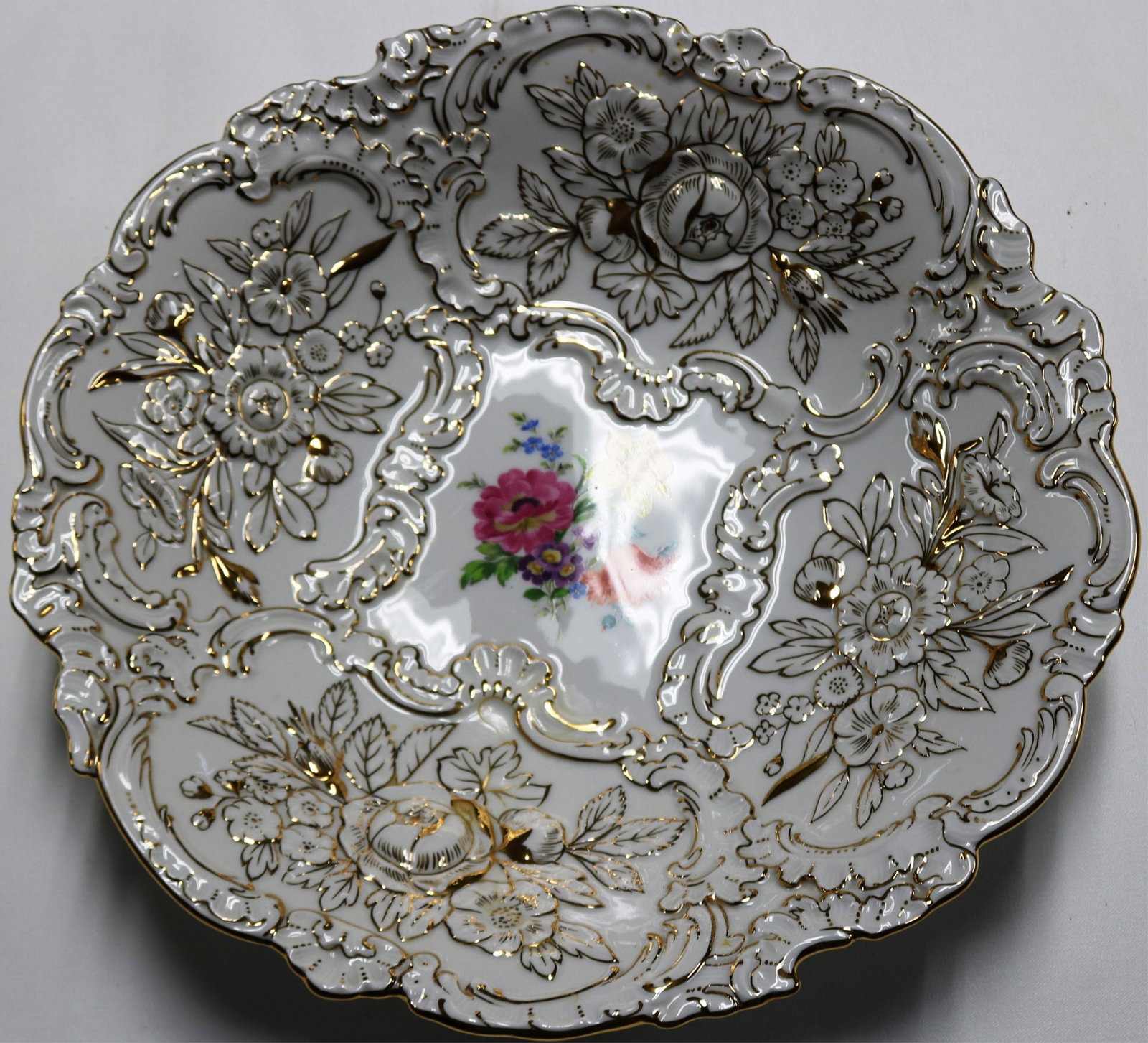 MEISSEN SERVING BOWL WITH GILT EMBOSSED: DECORATIONS, FLORAL PAINTED CENTER, 2 1/2" H, 12 1/4" DIA.