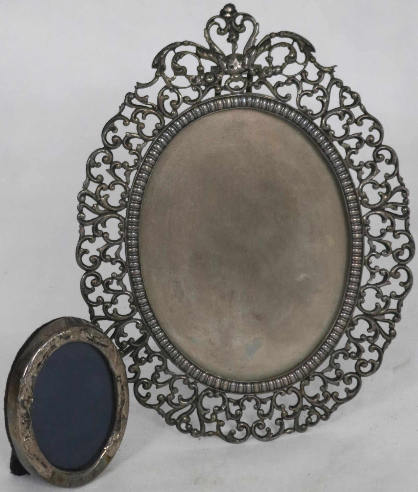 2 STERLING SILVER PICTURE FRAMES TO INCLUDE: GORHAM EASEL STYLE AND SMALL ENGLISH HALLMARKED FRAME, 5.18 OZT, 3" - 7 1/2" H, 2 1/4" - 5 3/4" W