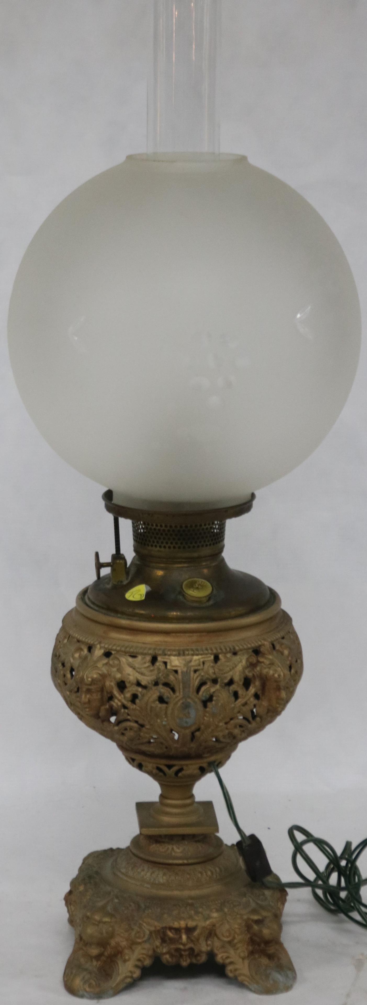 VICTORIAN CAST METAL LAMP, LION & LADIES HEADS,: ETCHED FROSTED BALL SHADE, ELECTRIFIED WITH BRADLEY & HUBBARD FILLER CAP, 23" H, 9" BALL SHADE