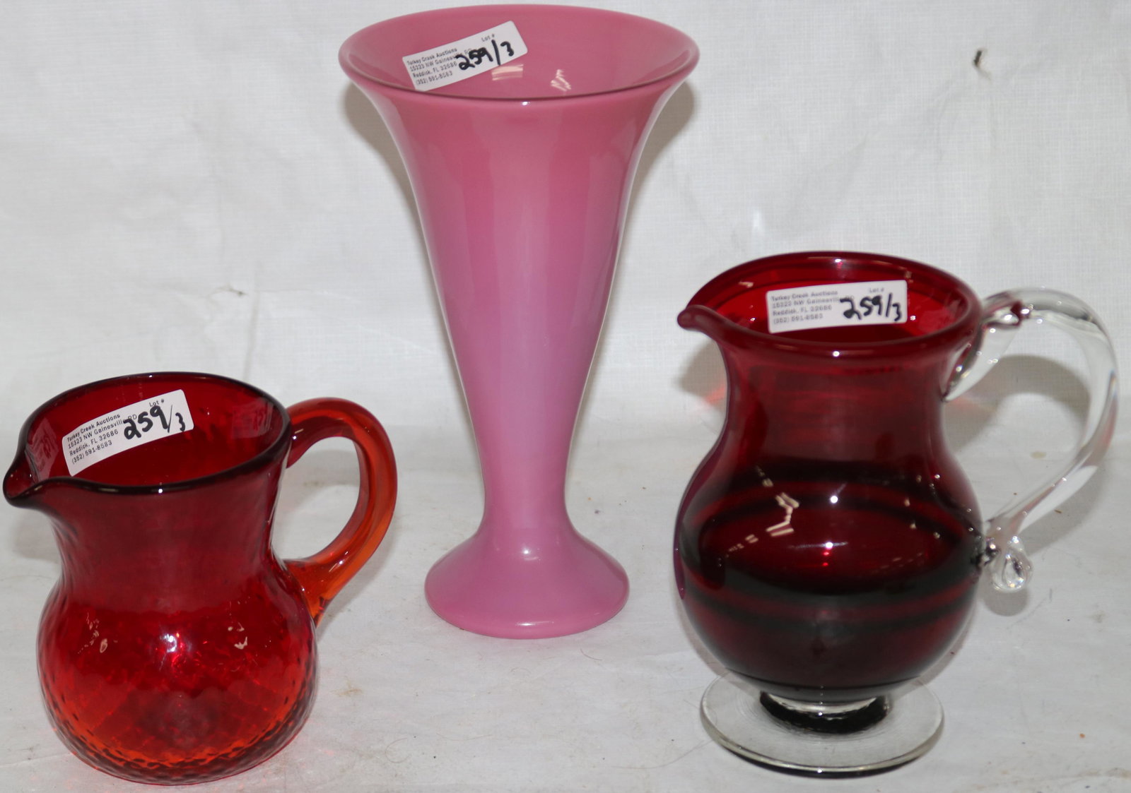 3 PCS. OF BLOWN GUNDERSON PAIRPOINT TO INCLUDE 6": RUBY & CLEAR PITCHER, 4" AMBERINA PITCHER & 7 1/2" PEACH BLOW VASE
