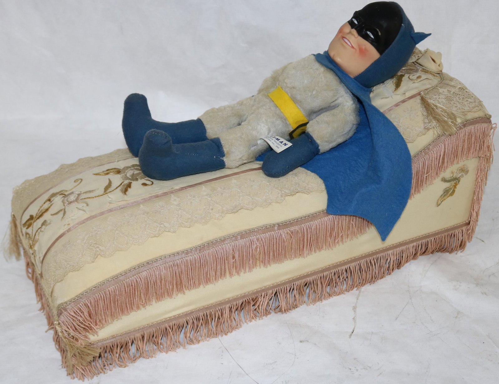 VINTAGE 1966 STUFFED BATMAN DOLL WITH PLASTIC: FACE, 15" H, TOGETHER WITH VINTAGE DOLL FAINTING COUCH, EMBROIDERED TASSELED UPHOLSTERY, SHOWS SLIGHT DAMAGE, 7" H, 21" W, 9" DEEP