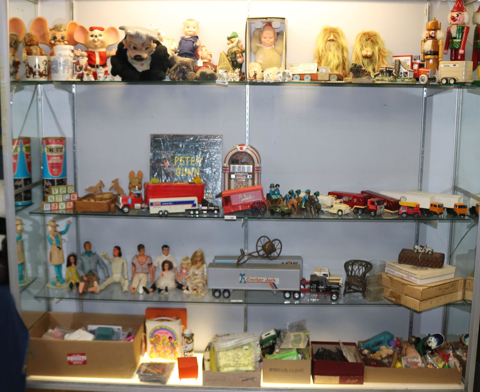 LARGE CASE LOT OF MISC. TOYS TO INCLUDE TRUCKS,: DOLLS, ACTION FIGURES, TINKER TOYS, ETC.