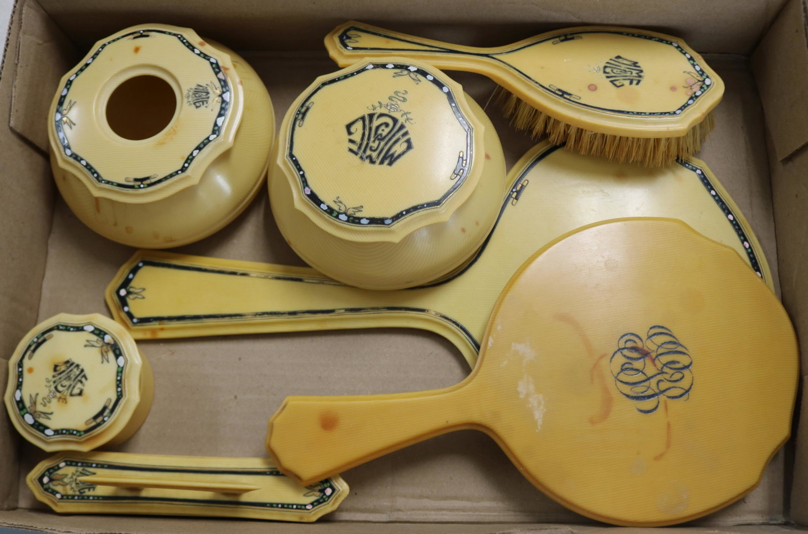 7 CELLULOID ITEMS INCLUDING 6 PC. DRESSER SET &: ODD MIRROR