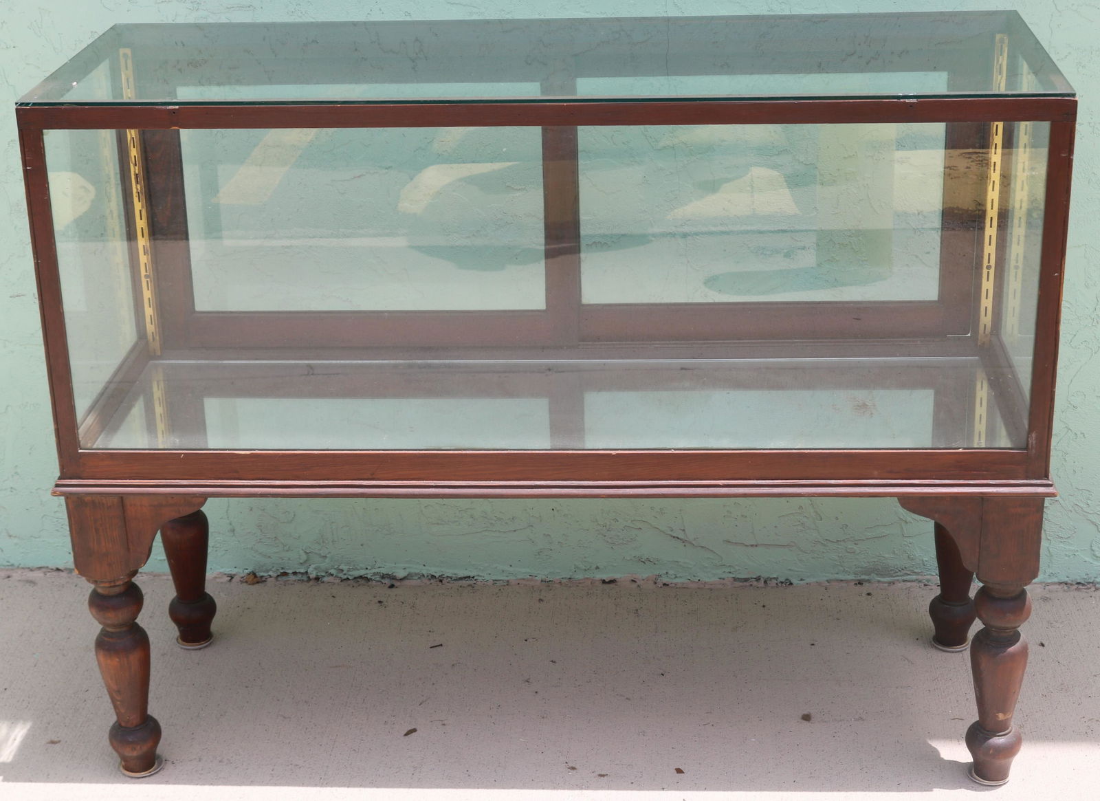 SMALL COUNTRY STORE STYLE SHOW CASE ON TURNED (1 of 1)