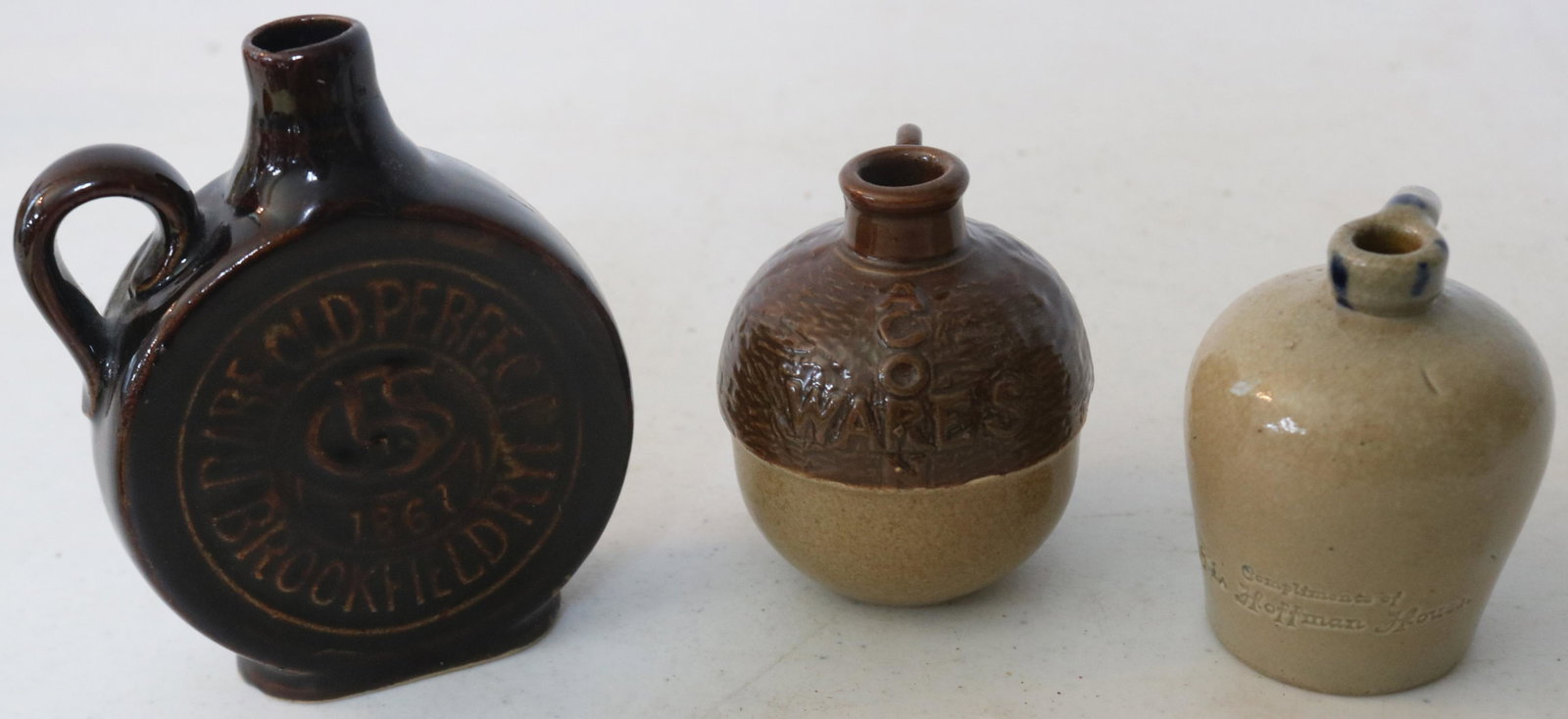 3 MINIATURE STONEWARE JUGS, RARE, OLD, PERFECT,: BROOKFIELD RYE 1867 4 1/2" H, ACORN ARES, NUT SHAPED BOTTLE, 3" H, COMPLIMENTS OF THE HOFFMAN HOUSE, STAMPED 3" H
