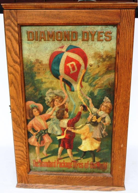 VICTORIAN OAK DIAMOND DYES CABINET: LITHO TIN FRONT WITH CHILDREN IN BALLOON, ADVERTISING ON BACK, 24 1/2" H, 15 1/4" W, 8 3/4" D