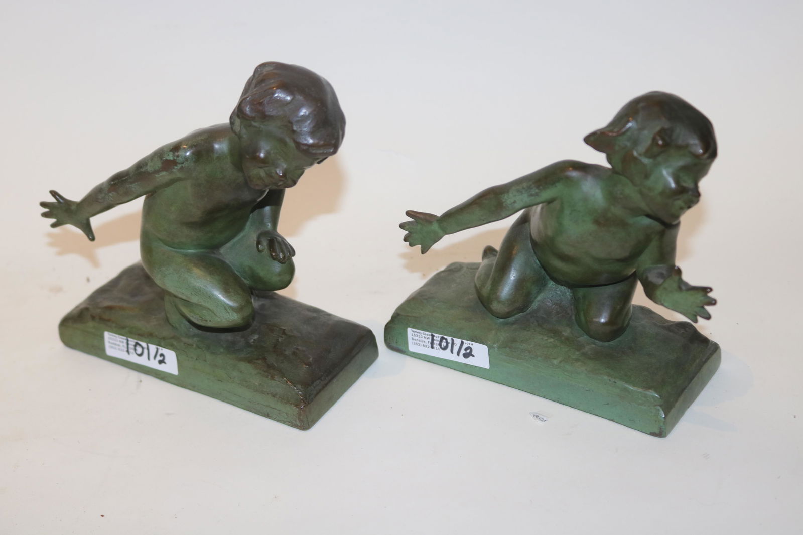 E. BARRETT PARSONS (1878-1956 NEW YORK) BOOK ENDS (1 of 3)