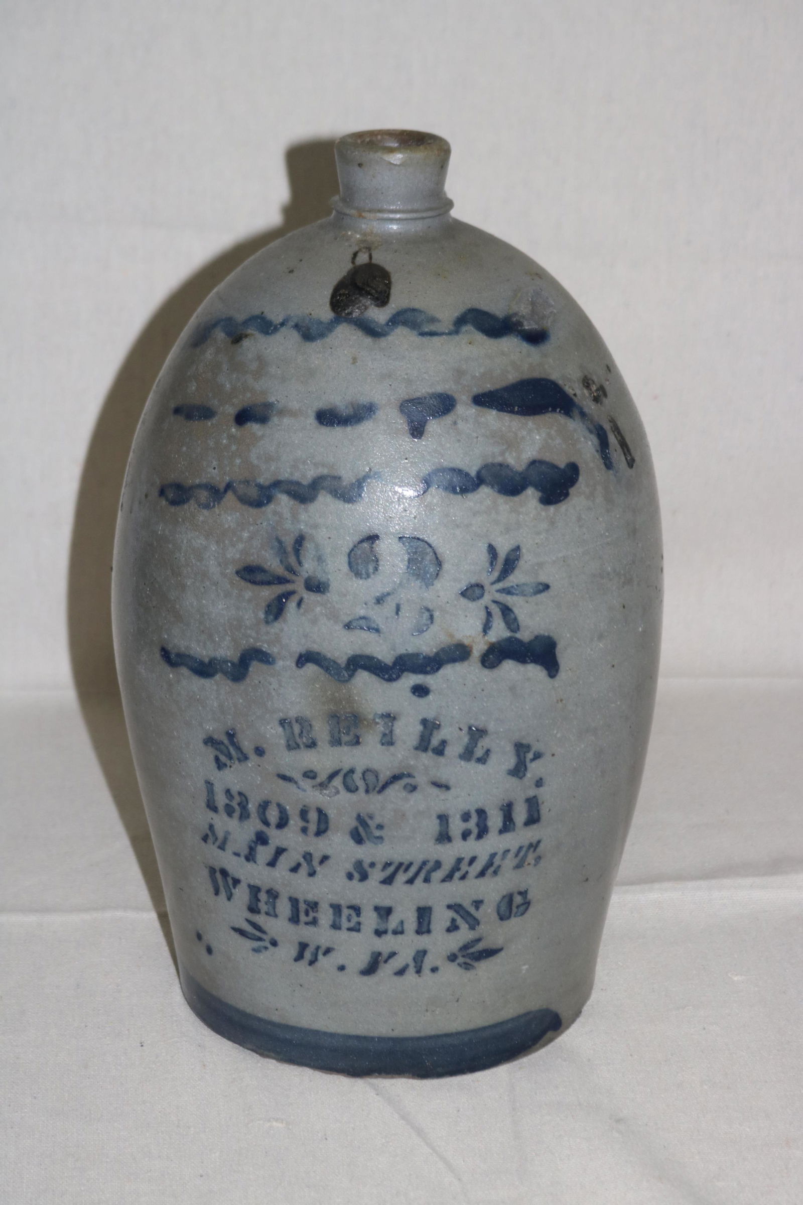 19TH CENTURY STONEWARE SLIP DECORATED JUG (1 of 4)