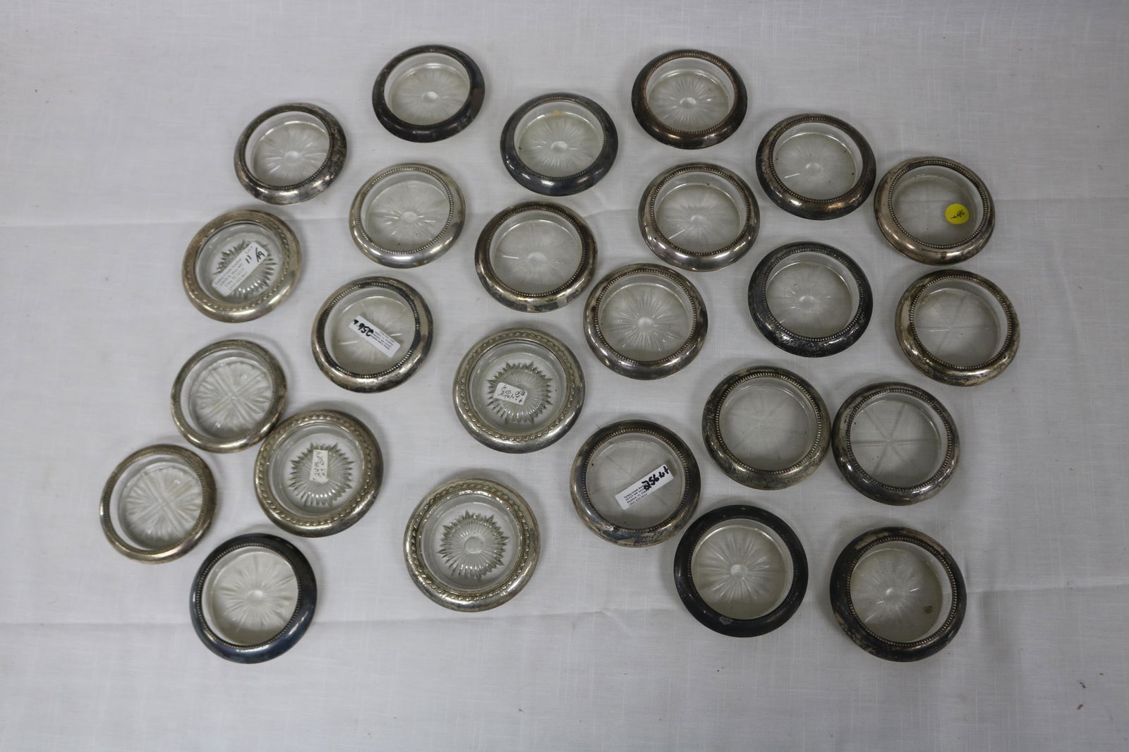 TWENTY FIVE STERLING AND GLASS COASTERS (1 of 3)