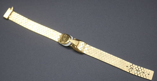 18K LADIES BRACELET WATCH BY GUBELIN 8" L, 33.3